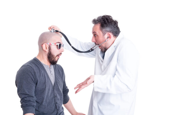Patient and doctor laughing